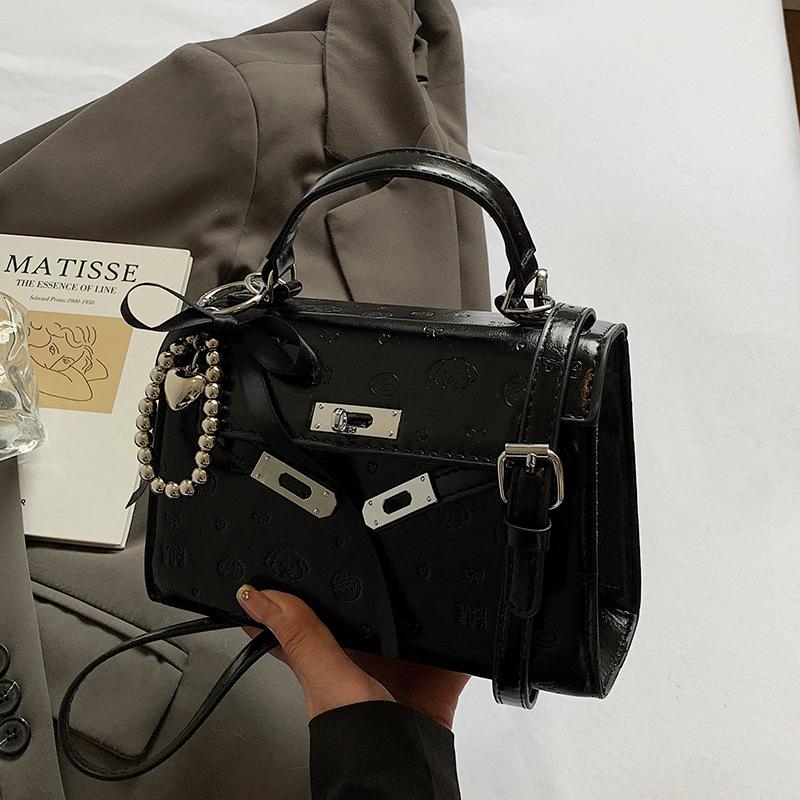 Нишевая дизайнерская сумка женская новая летняя универсальная на плечо корейская версия ins портативная сумка Келли сумка-мессенджер