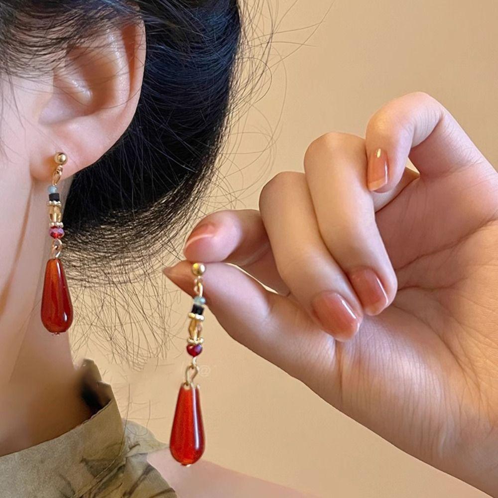 

Fashion Red Water Drop Earrings High sense Pendant Ear Stud Retro Tassel Earrings Horse Face Skirt красный