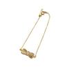 BONBEAU Morris pajarita colgante pulsera chapada en oro