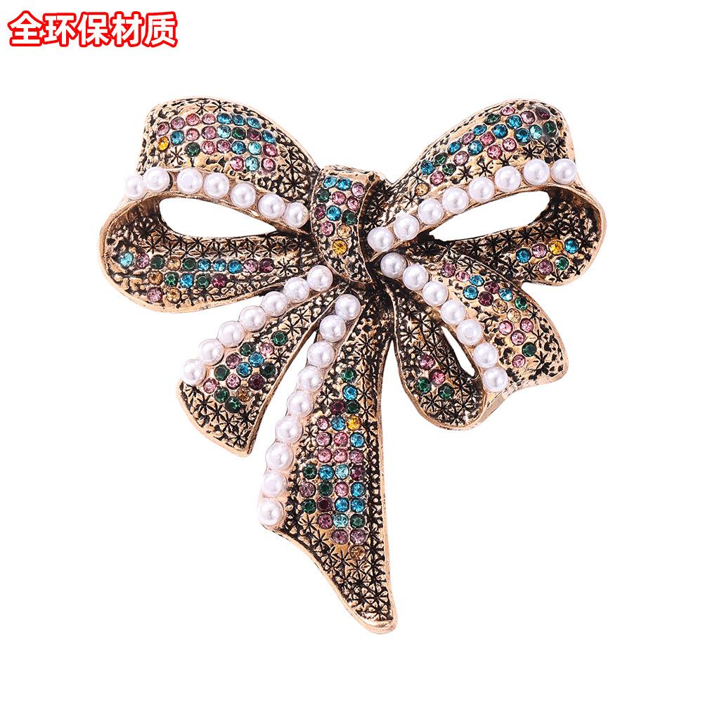 High-end bow brooch retro temperament high-end corsage fashion coat accessories fixed clothes pin