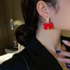 Orecchini pendenti con nodo a fiocco di cristallo di nuova moda per le donne Orecchini pendenti con zirconi a forma di cuore di perla rossa Regali di gioielli per festival di Capodanno di Natale