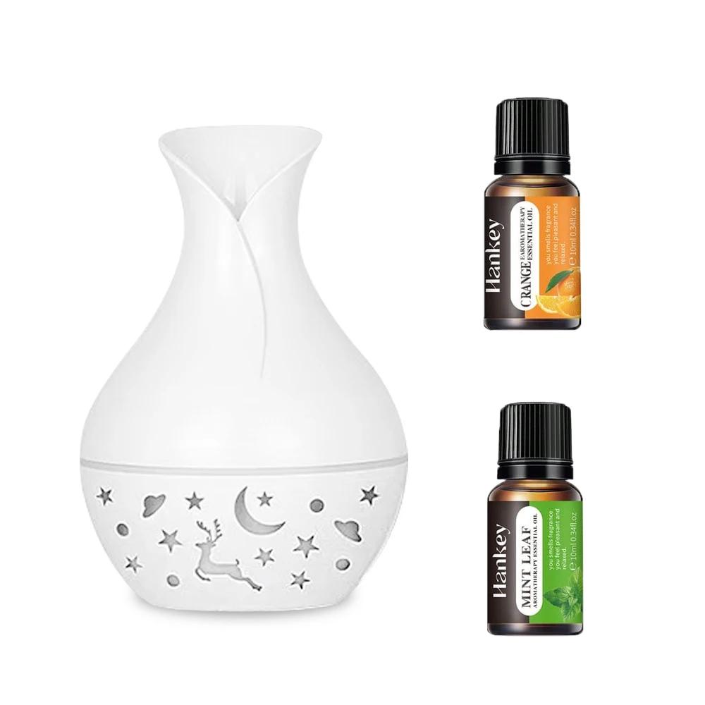 

USB Desktop Air Humidifier Ultrasonic 200ML Essential oil diffuser Cold mist Air moisturizer and two bottles of essential oil. White