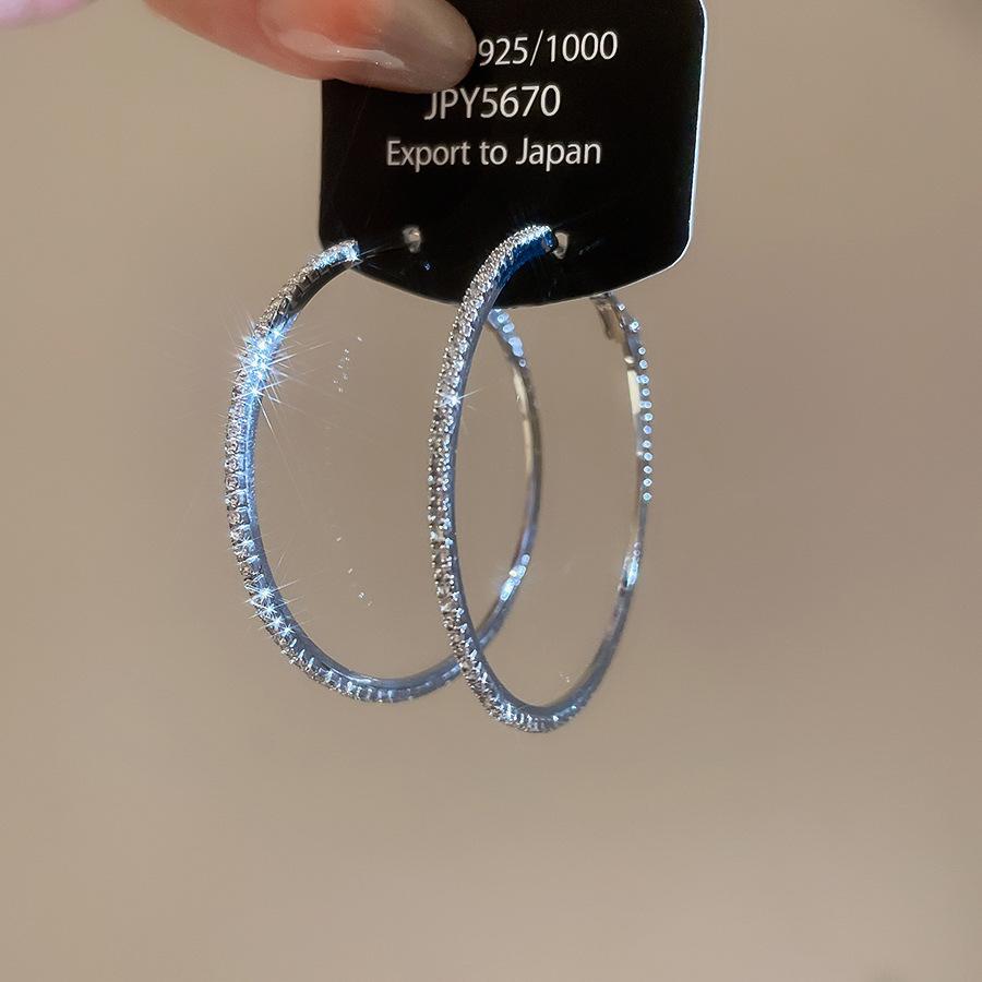 Европейские и американские серьги-кольца с цирконами, клипсы, преувеличенные серьги нишевого дизайна, серьги в стиле легкой роскоши.