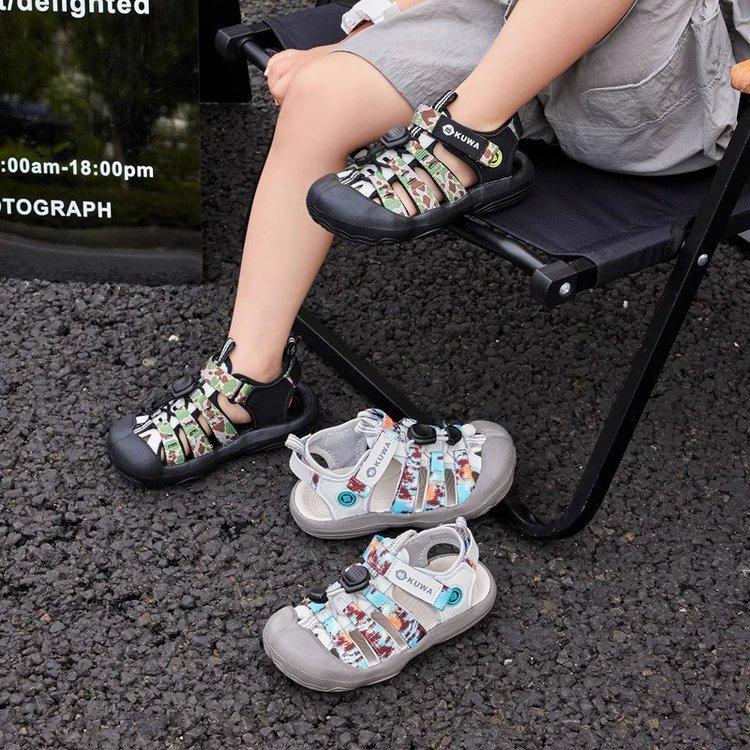 Boys sandals 2025 summer new children's outdoor printing hollow bag head sports sandals girls casual shoes
