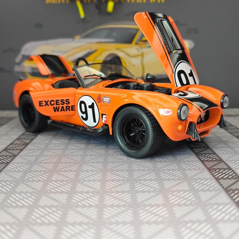 CDKM1 1:22 simulation Ford Cobra convertible sports car alloy model car ornament, door can be opened, steering shock absorber