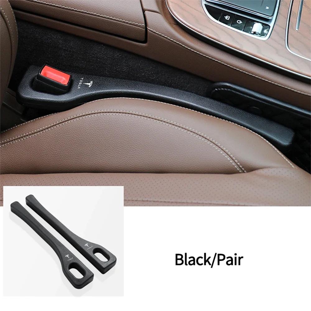 

Car Sticker 2025 Hot 2Pcs Car Seat Gap Plug Filling Anti-Leakage Strip For Tesla Model 3 Y S X Roadster Juguete SpaceX Cybertruc