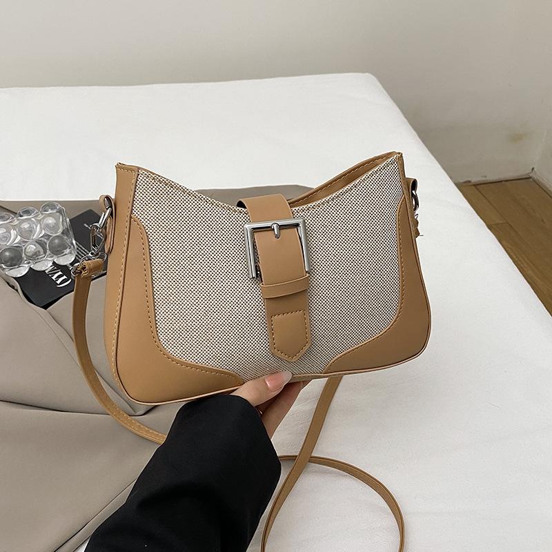 Korean version of fashion contrasting color portable small square bag women's 2025 spring new light luxury foreign style shoulder bag high sense armp