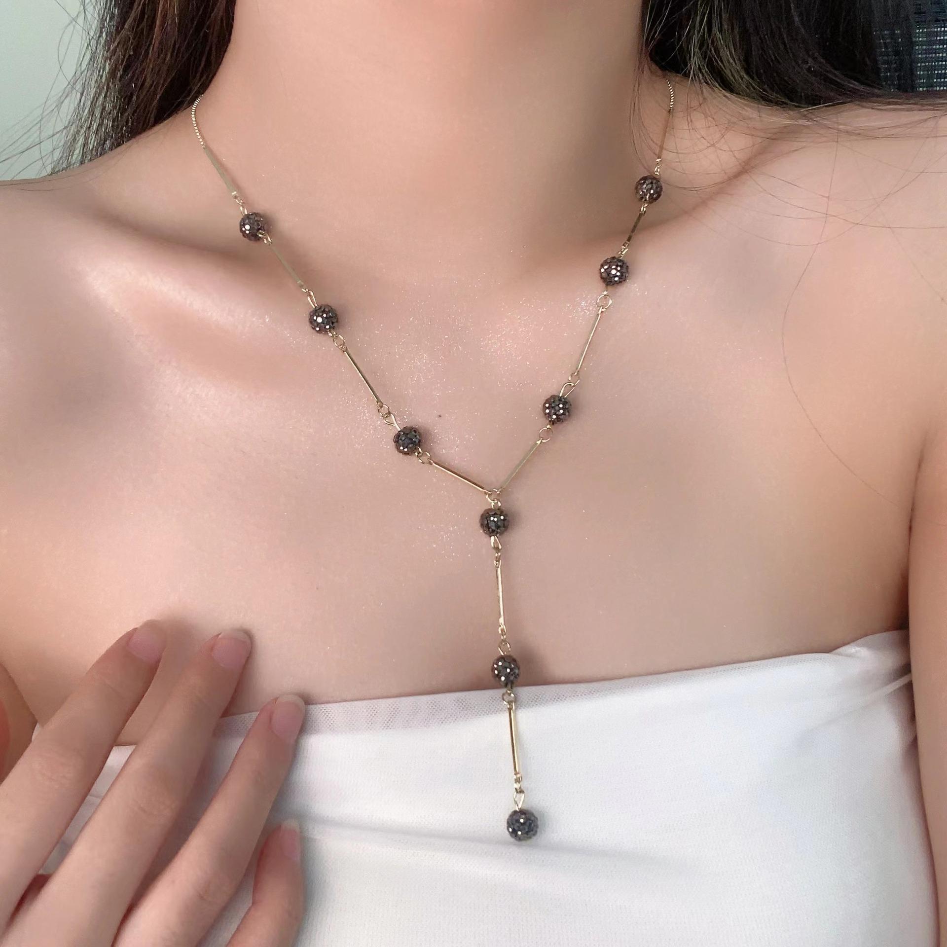 

Copper gold-plated pendant light luxury black zircon fringed necklace temperament fashionable European and American explosion
