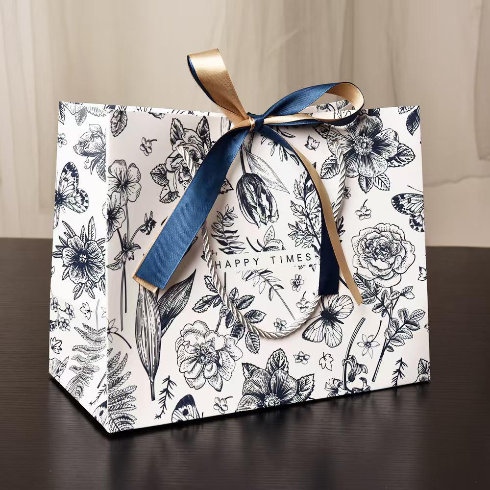 In Stock Cross-Border Gift Bag: Patterned Paper with Ribbon, Holiday Clothing Tote