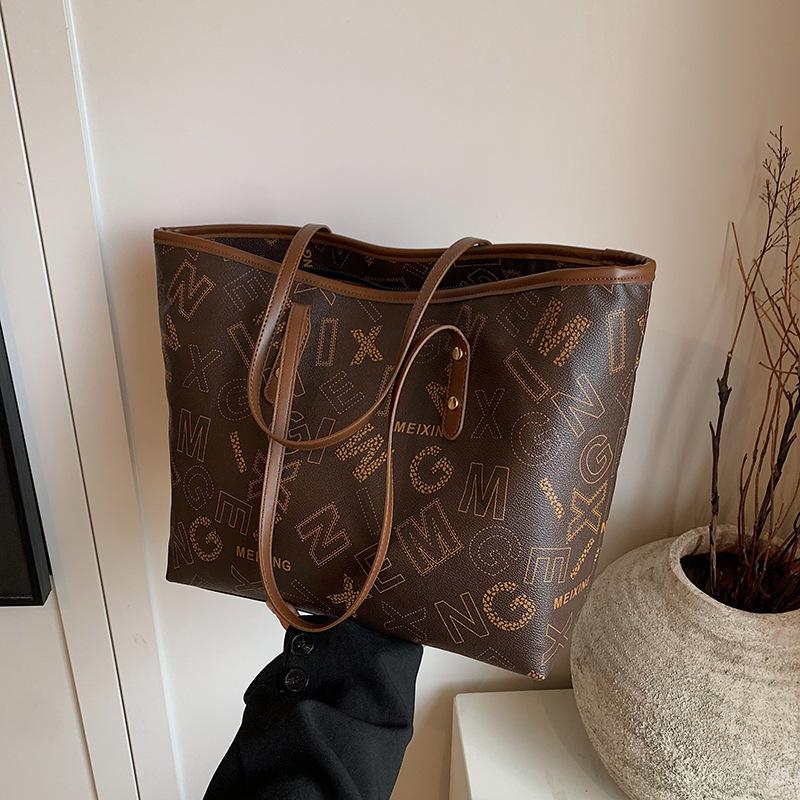 

Винтажная сумка-тоут с принтом для поездок на работу женская 2025 новая высококлассная универсальная сумка через плечо повседневная вместительная сумка