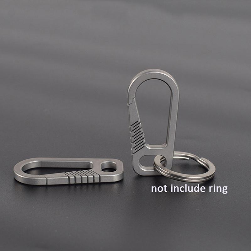 

Мини-брелок из титанового сплава с интегрированной быстрой фиксацией и эластичной пряжкой для мужской талии 4.4*2.0cm