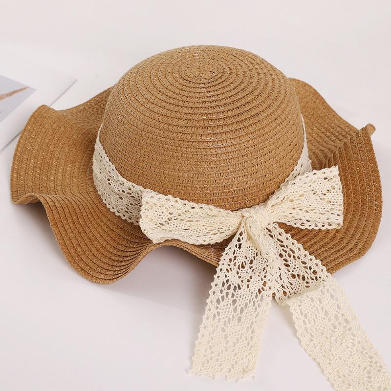 

Новая соломенная шляпа ранней весной, кружевной бант, солнцезащитная модная волнистая шляпа, козырек для прогулок на открытом воздухе Children s [54-56cm] кофейный