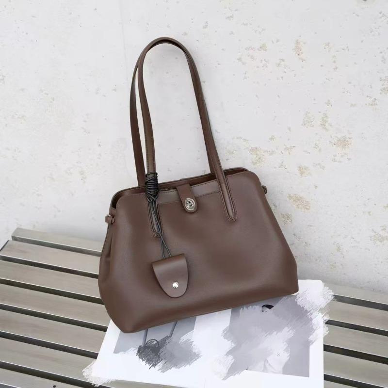 Leder-Umhängetasche große Kapazität vielseitig Herbst und Winter neu Achseltasche leichter Luxus Anhänger schlicht Nische Damen-Tasche