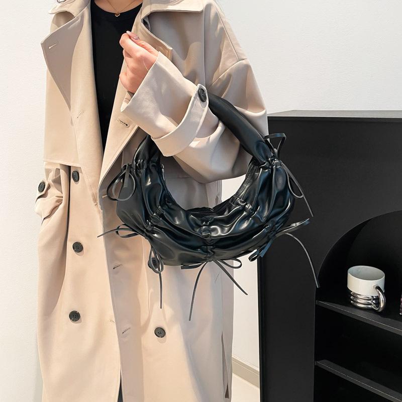 2025 new pleated bow design portable crescent bag, high-end fashion niche trendy shoulder armpit bag