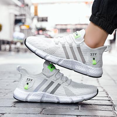 Comercio exterior ultraligeras talla grande zapatillas de correr de moda para hombre zapatillas tejidas voladoras de malla transpirable casuales zapatillas deportivas de palomitas para parejas hombre