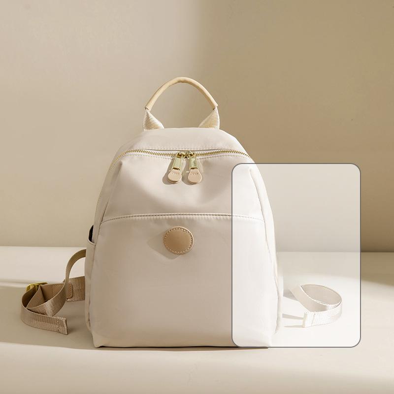 Leichter Nylonstoff Kleiner Rucksack für Damen Neue Mode Wasserdichte Oxford-Stoff Reisetasche Pendeln Einfacher Rucksack