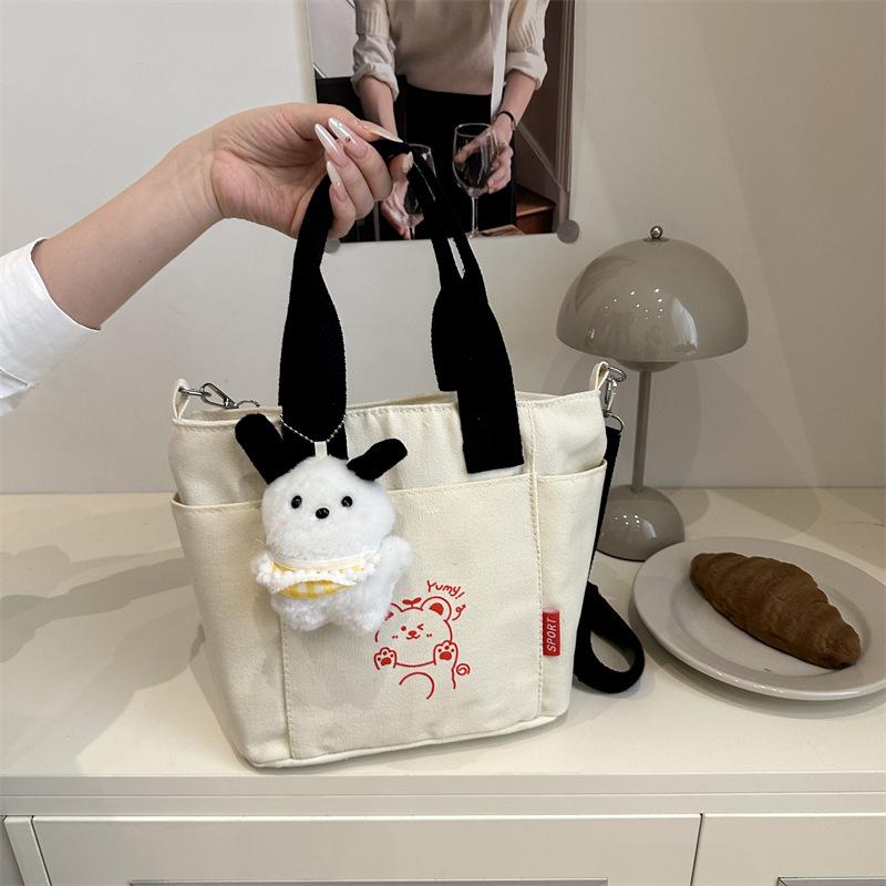 

Cute cartoon print new bucket bag female students go out in class fashion casual canvas versatile messenger bag No pendant чёрный