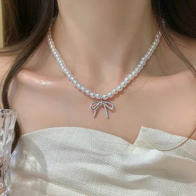 Light Luxury Niche High-end Shijia Glass Pearl Bow Pendant Necklace Women's New Temperament Beaded Collarbone Chain