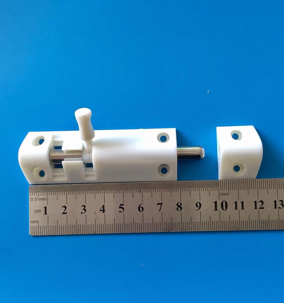 White Wooden Door with Plastic Window Bolt: Large Household Hardware Accessory.