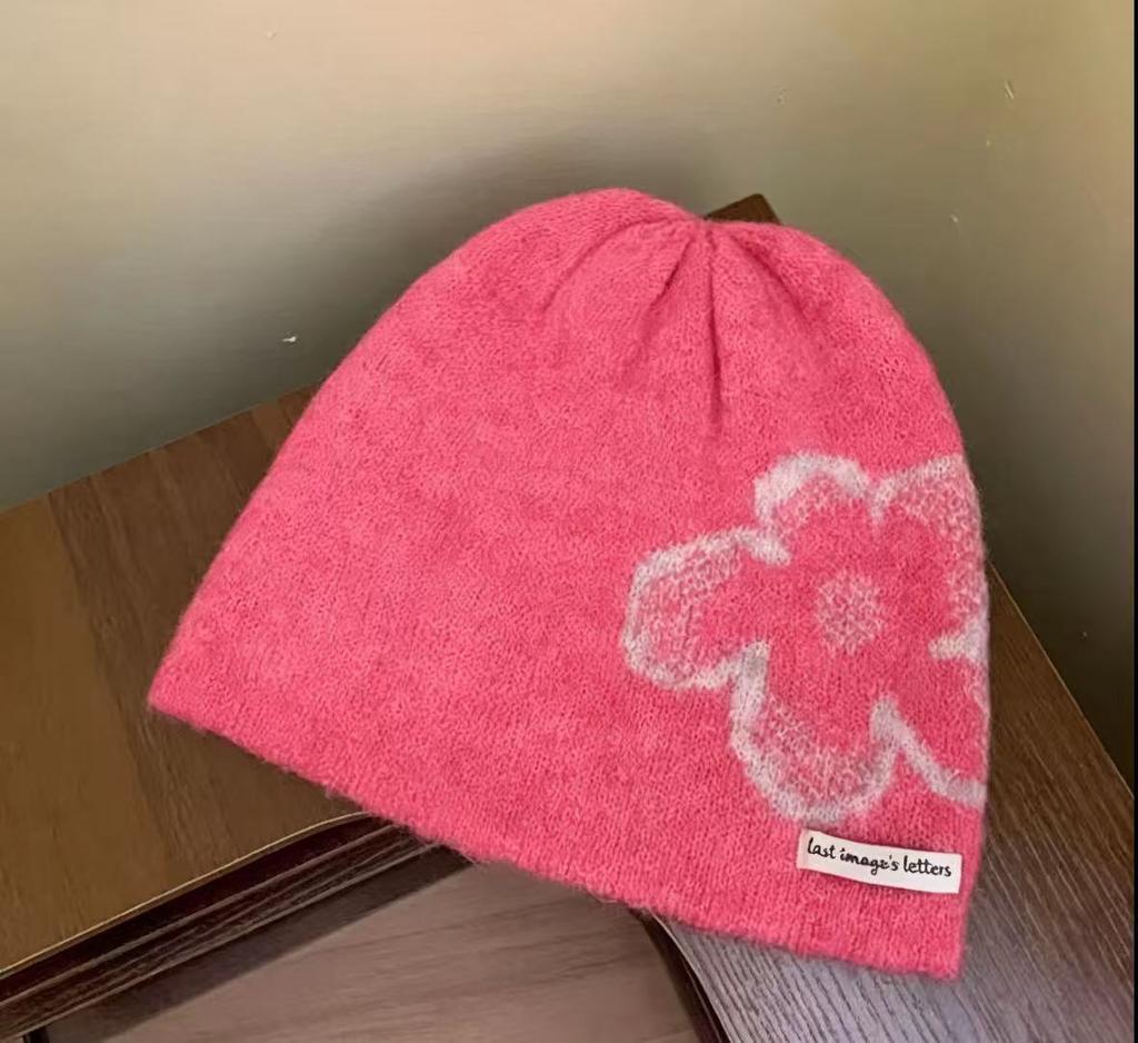 Korean version of fashionable and simple flower knitted cold hat women's winter warm atmosphere heap hat big head circumference bag head hat