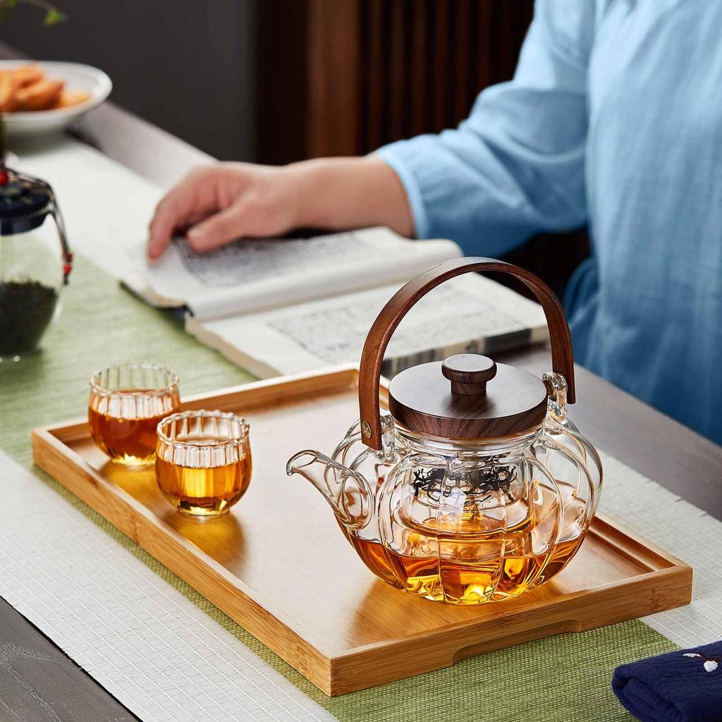 Pokaro Tea Heat-Resistant Glass Teapot, Pumpkin Shape, 940ml, Vertical Stripe Design, Suitable for Steaming and Boiling Tea, Includes Tea Strainer,