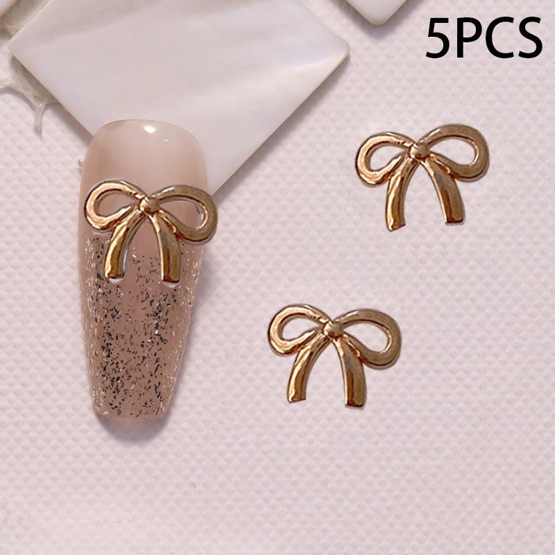 5 Stuks/Zak Elegante Legering Strik Nagel Charms 3D Metaal Zilver Goud Champagne Goud Licht Luxe Holle Strik Super Fee Nagellak Accessoire