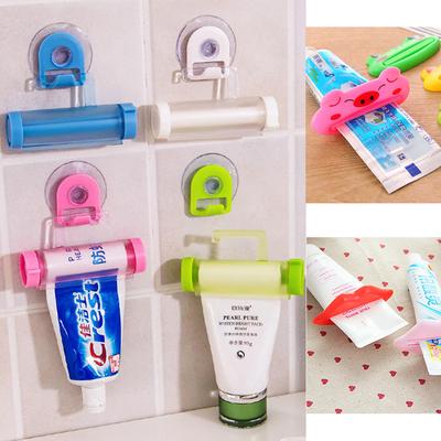 1 Pcs ABS Rolling Squeezer Toothpaste Dispenser Tube Partner Sucker Hanging Holder KTY
