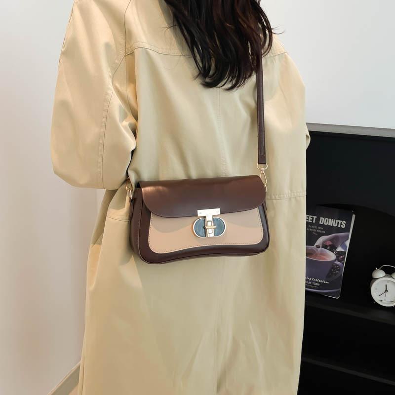 Neue leichte Luxusmode kleine quadratische Tasche, personalisiertes Trend-Nischendesign, einzelne Schulter Umhängetasche Pendlertasche Frau