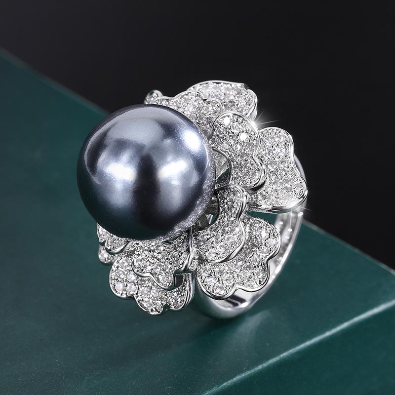 

Ювелирные изделия Покрытая медью Настоящее золото Инкрустированная перламутром Серая жемчужина Бриллиант Цветок Женская подвеска Ожерелье 14 мм