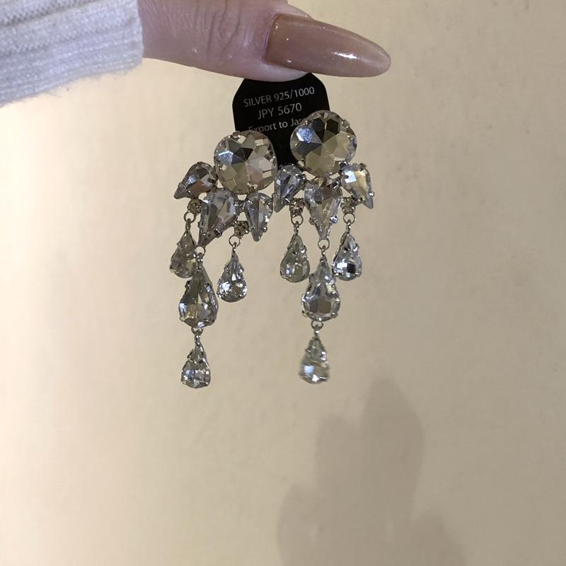 Silver Needle Rhinestone Water Drop Tassel Earrings: Elegant, High-End Fashion Accessory for Women.