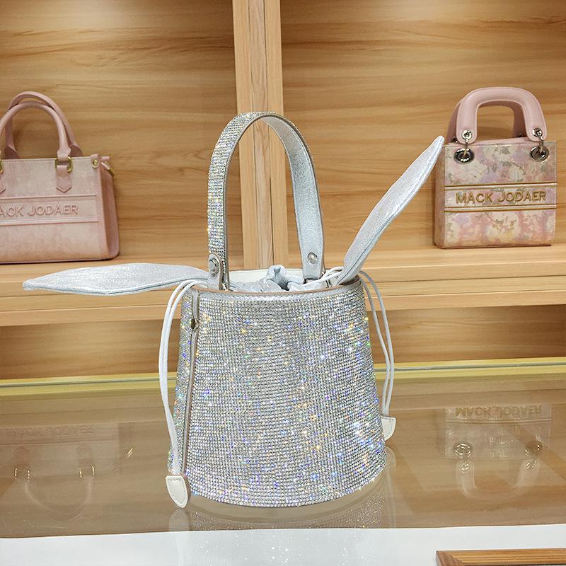 Женская сумка-ведро с цепочкой и бантом из стразов класса люкс - Мода 2025