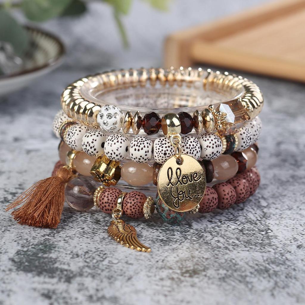 Bohemian Trendy Bracelet with Wings, 'I Love You' Tassel Pendant, and Retro Creative Design