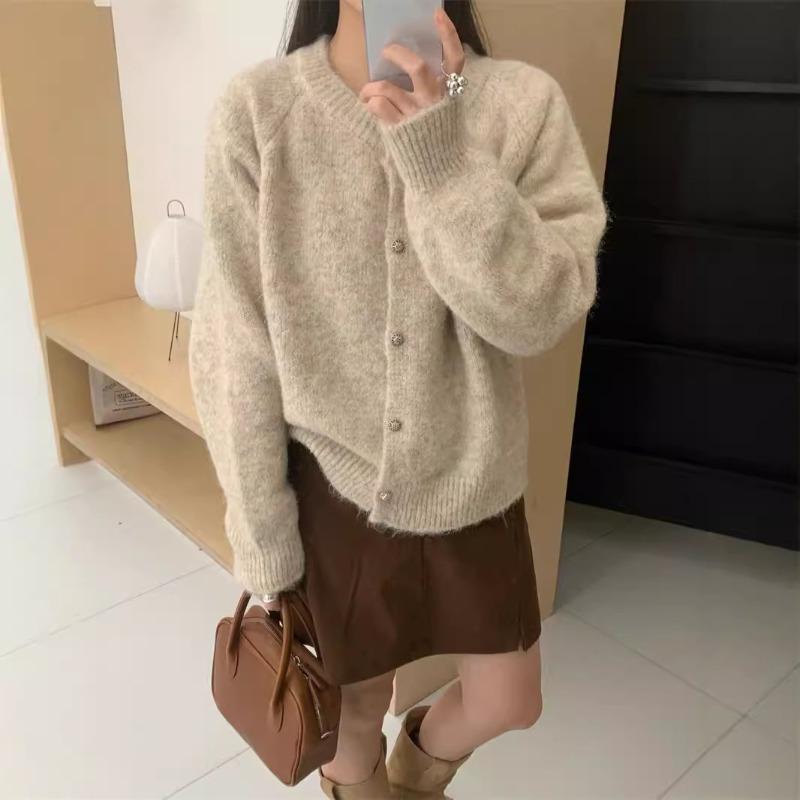 Solid color gentle temperament knitted cardigan top women's autumn and winter new fashion soft waxy versatile sweater jacket tide