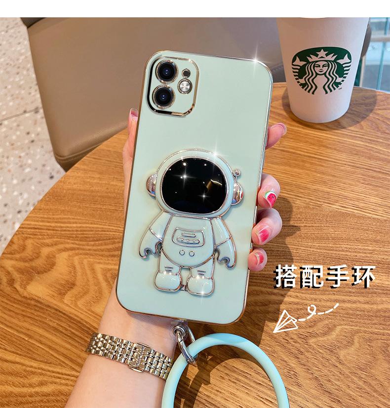 Astronaut bracket is suitable for Apple 17 mobile phone case electroplating all-inclusive soft case iPhone16 folding bracket with bracelet.