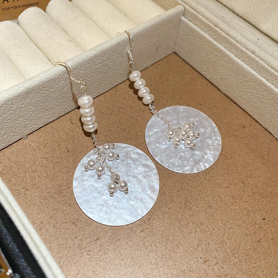 Seaside vacation style flower shell fringed long earrings stud earrings women s earrings design sense