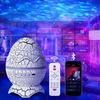 Dinosaur Egg Table Lamp and Projector: Starry Sky and Nebula Light with Remote-Controlled Speaker for Nighttime Ambiance.