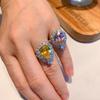 Wish European and American style retro simulation powder Huangbao water drop ring main stone 10 * 14