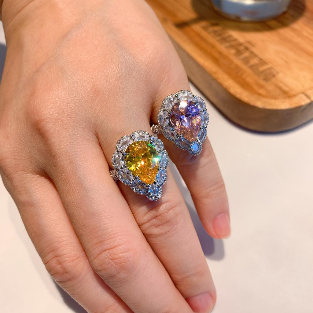 Wish European and American style retro simulation powder Huangbao water drop ring main stone 10 * 14