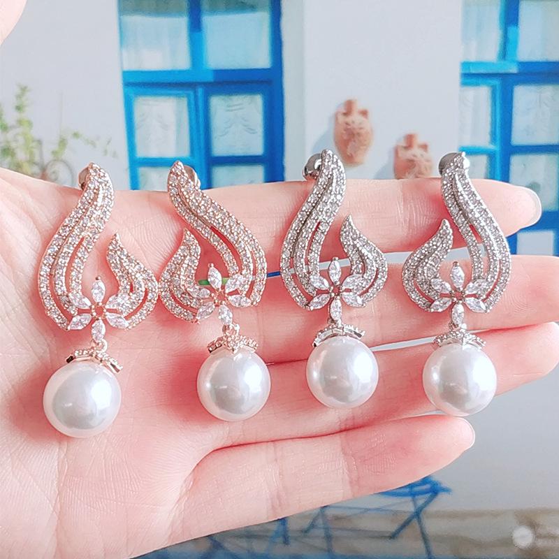 

Elegant Teardrop Shell Pearl Earrings with Zircon Flames - Summer Collection