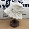 New Simple Solid Color Bucket Hat Women's Summer Metal Label Light and Thin Sunscreen Versatile Face Small Sunshade Sun Hat
