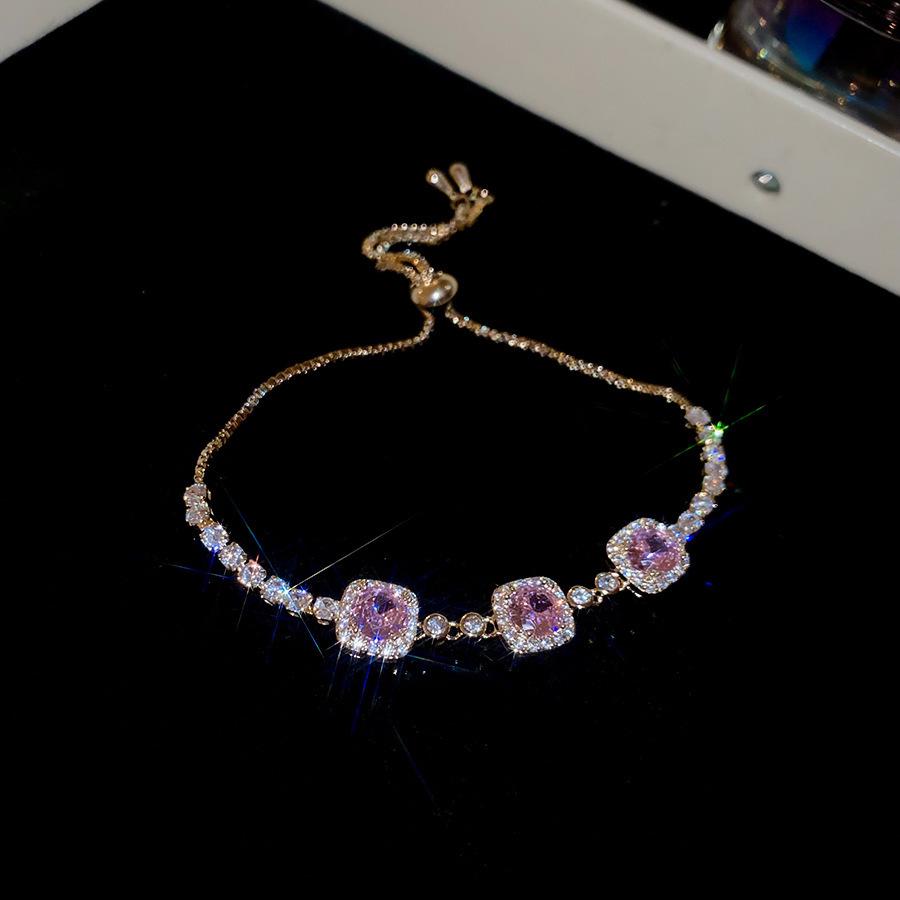 Pink Diamond Zirconia Starburst Flower Bracelet: Trendy, Luxurious Jewelry with Unique Design.