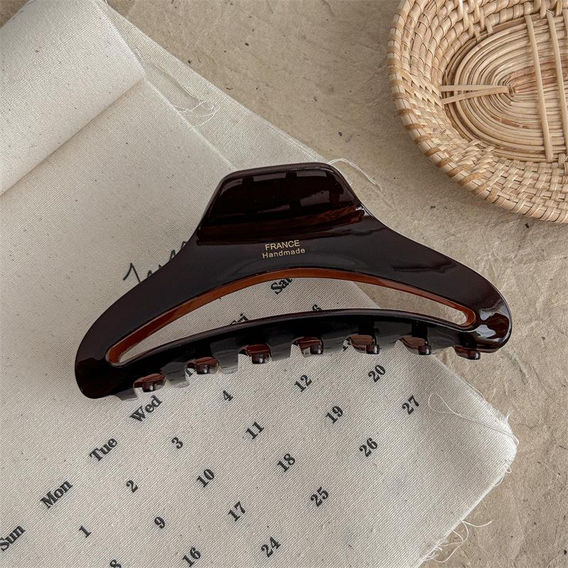 Gold-Labeled Acetate Dumpling Claw Clip Hair Accessory