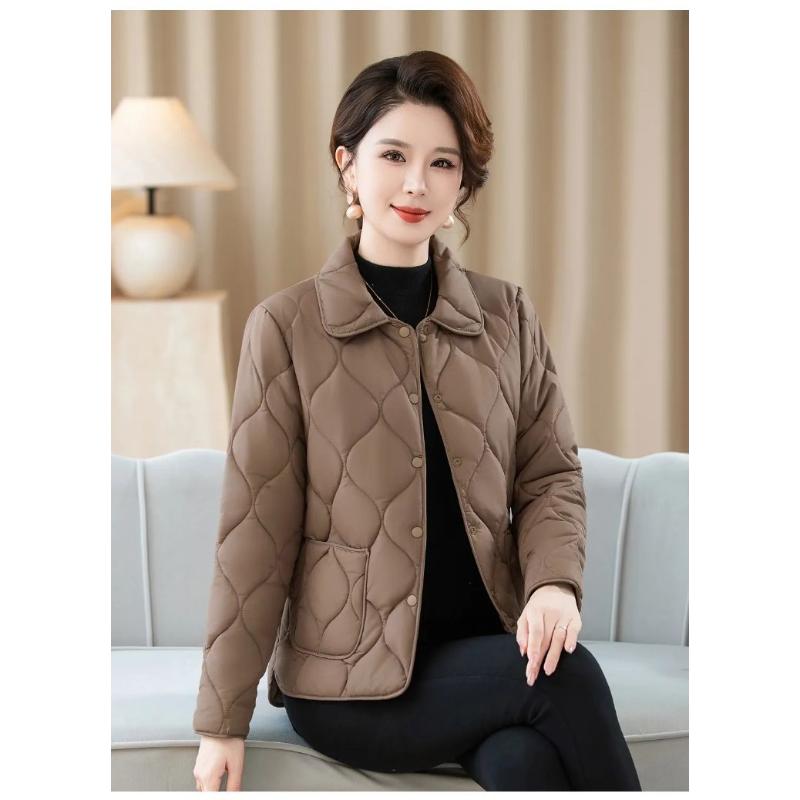 Nya Höst- och Vinter Dam Spliced Revers Knapp Ficka Mode Enfärgad Mångsidig Casual Långärmad Parkas