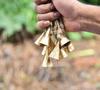 10-Pack Rustic Gold Metal Cow Bells with Jute Rope, 2-Inch Vintage Cone Bells for Crafts, Witch Bells, and Boho Farmhouse Wall Decor