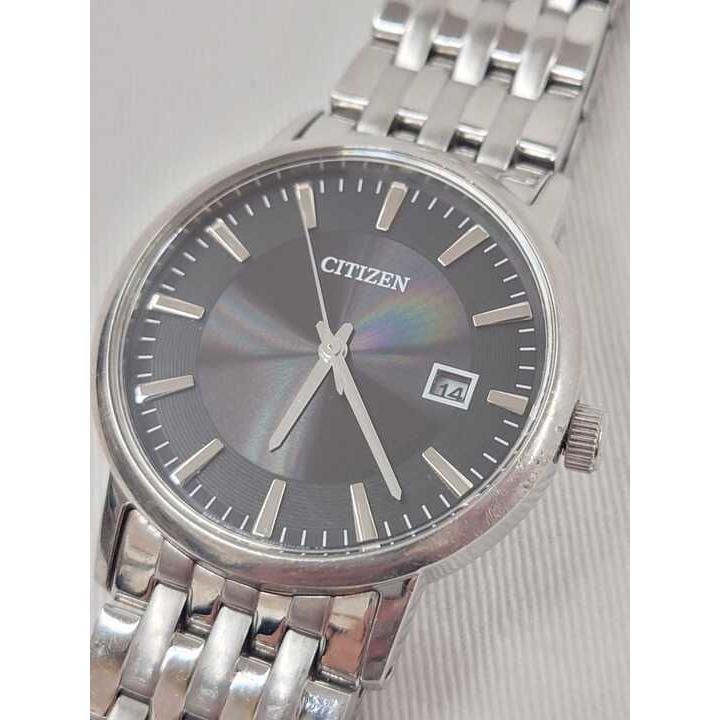 CITIZEN ECO-DRIVE E111-S067901 Men s wristwatch in operation with markings on the back
