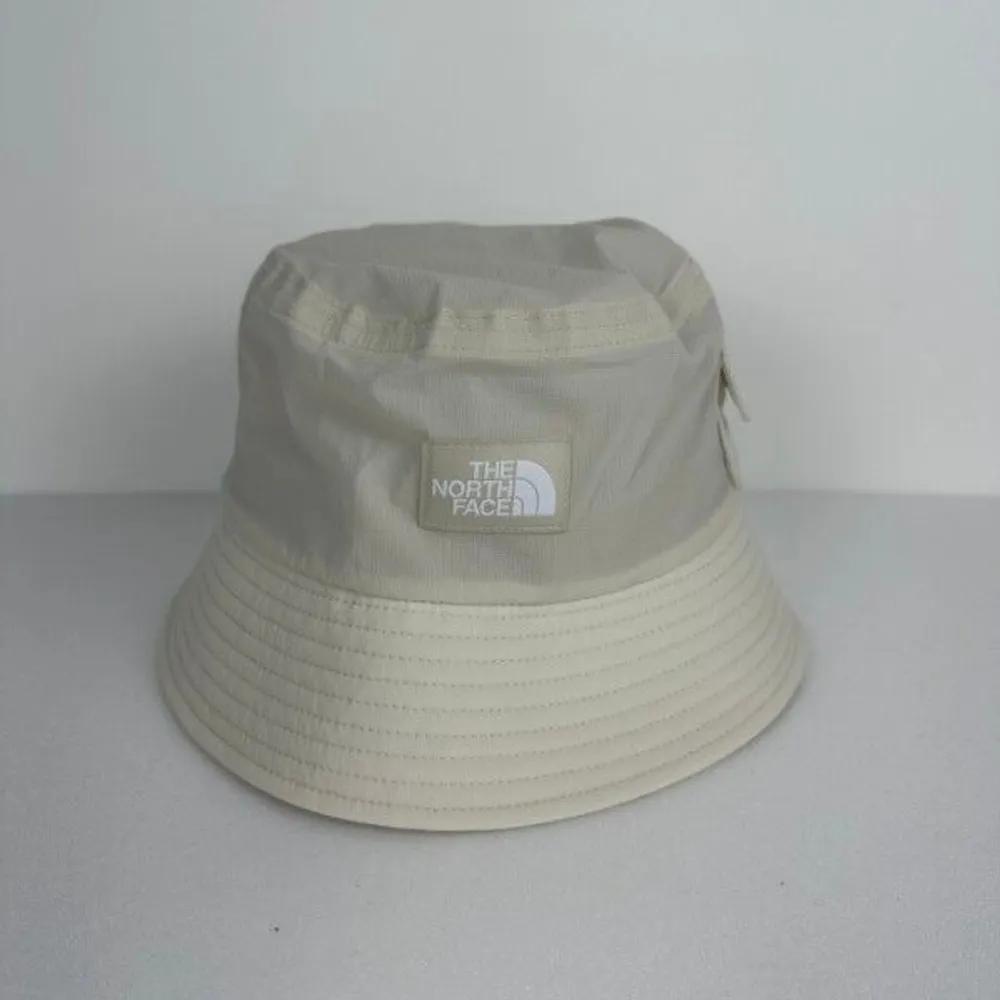 

[The North Face] Ice Cube Pocket Cap NE3HS11B Sandshell