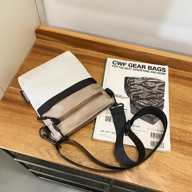 Korean casual trend messenger bag women's summer fashion sports portable Oxford cloth mobile phone bag versatile