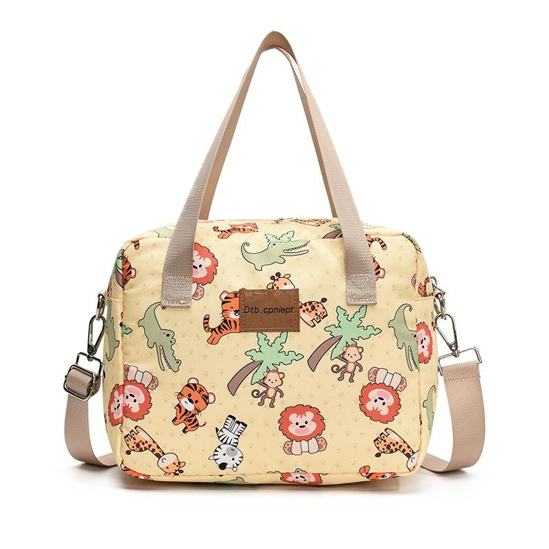 Single-shoulder slanted crossbody baby bag, cute cartoon design, large capacity, water-resistant, suitable for moms to carry out