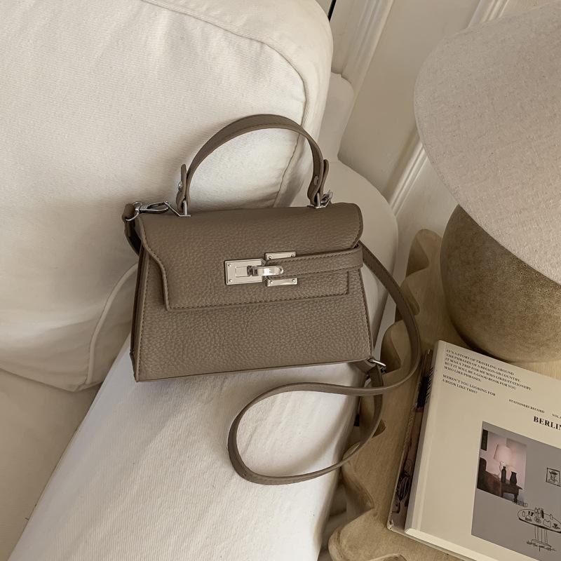 Elegant Commuting Bag for Work with A Chic Kelly Bag Style, Single-shoulder Cross-body Design.
