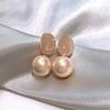 S925 Silver Needle Champagne Pearl Earrings Women's Ins Style Light Luxury Stud Earrings Explosive Earrings